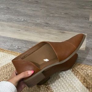 Brown leather flats